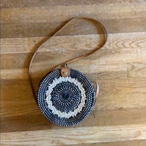 Round rattan woven bag.